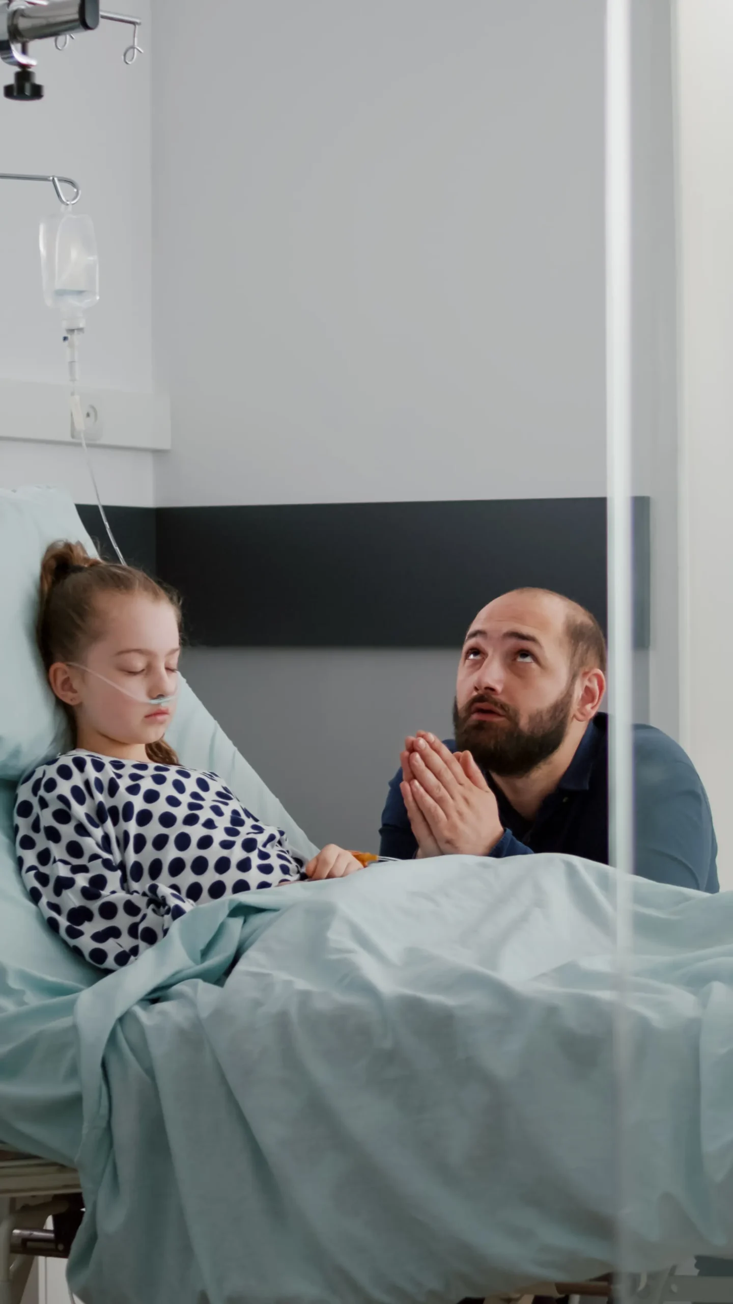 Patient father pray for her child